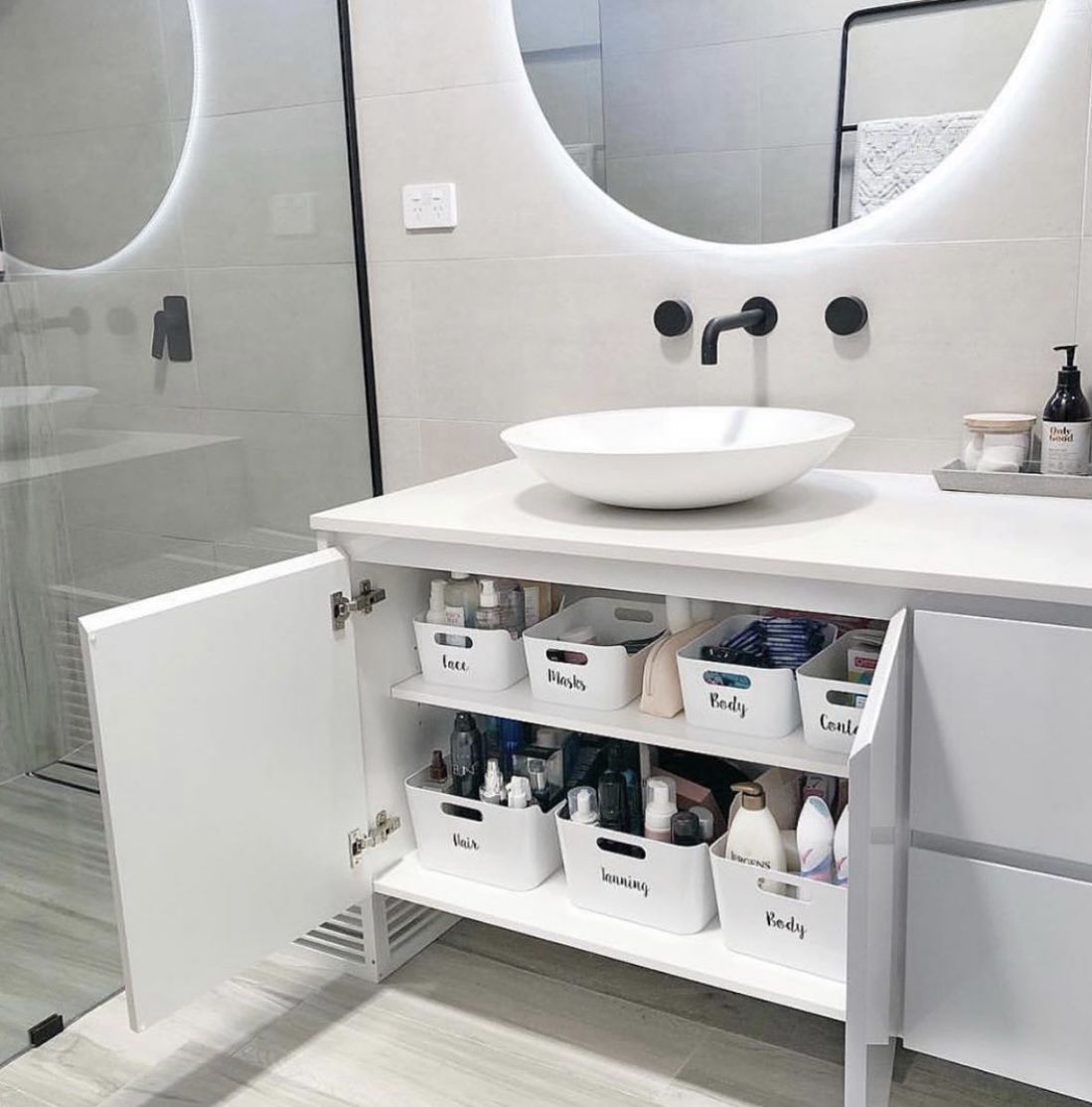 Luxury bathroom with organized vanity and curated essentials