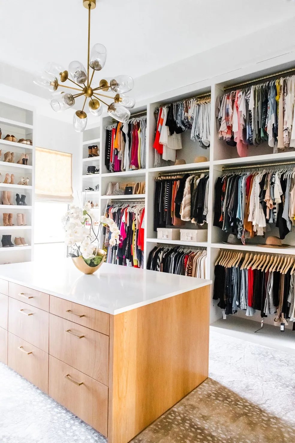Luxury walk in closet organized by Swoon Spaces in Manhattan